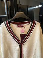 Cream Gucci knit cardigan V-neck with red and navy striped trim at neckline