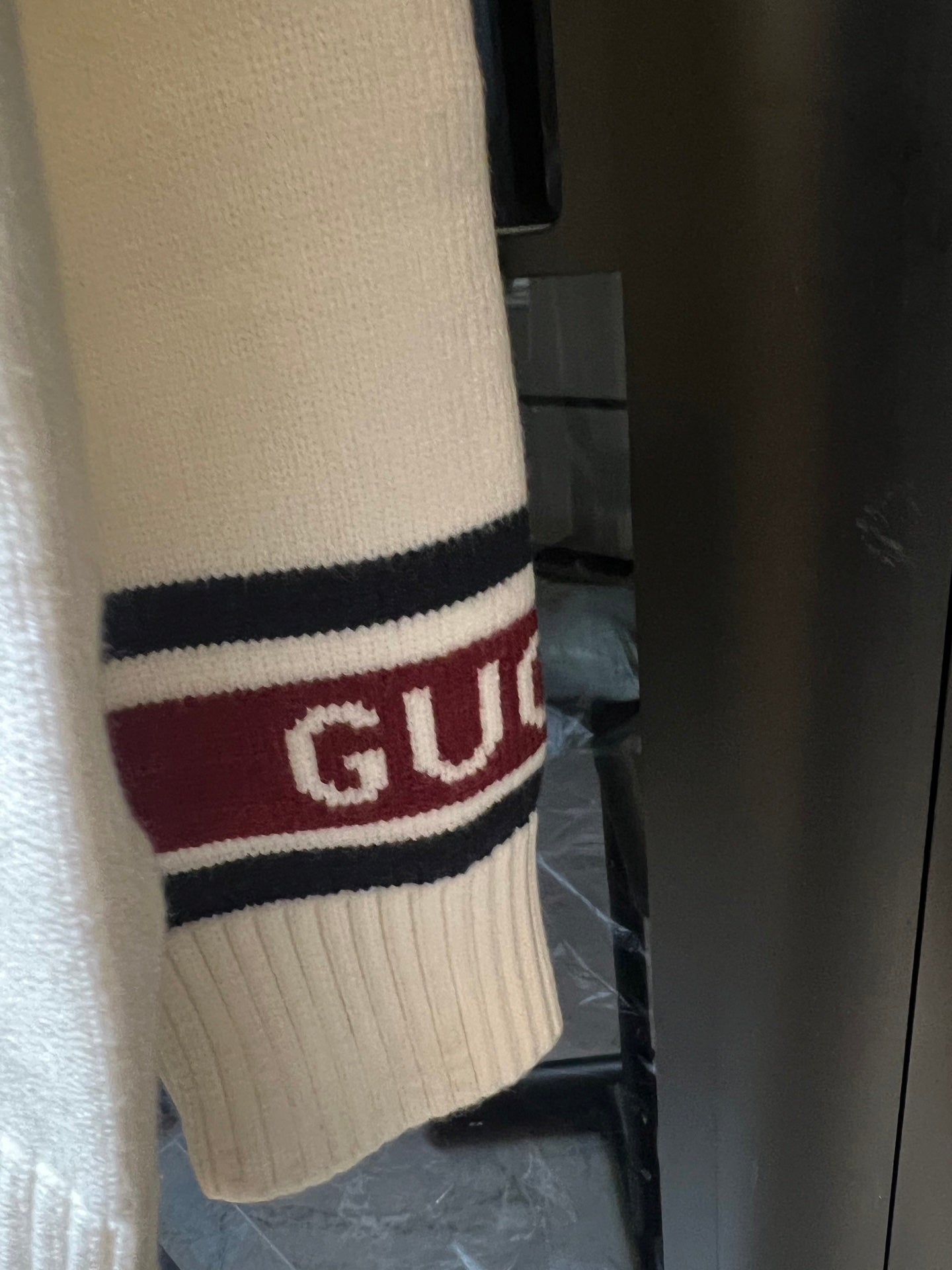 Cream Gucci knit cardigan sleeve cuff with striped logo band