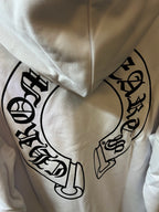 Light cream hoodie front with large black graphic print.