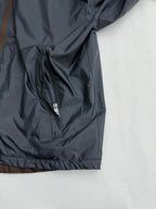 Prada hooded long jacket, blue-gray, front zip and pocket panel close-up