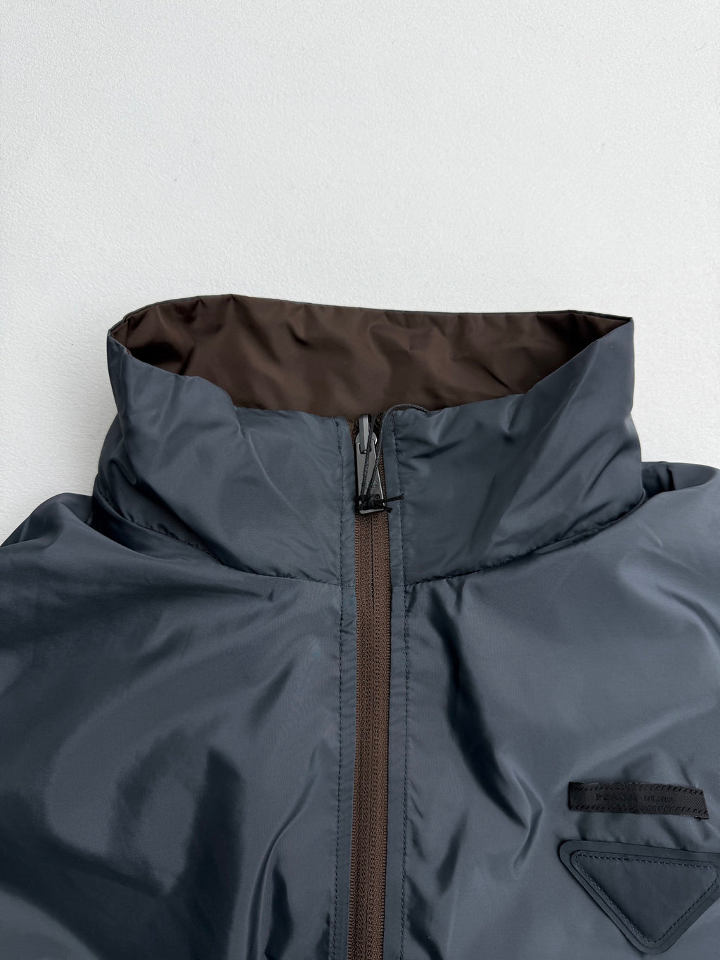 Prada hooded long jacket, blue-gray, hood lining and front zipper close-up