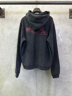 Dark pullover hoodie with hood and large red Balenciaga logo print on back