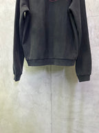 Dark hoodie with long sleeves and ribbed cuffs