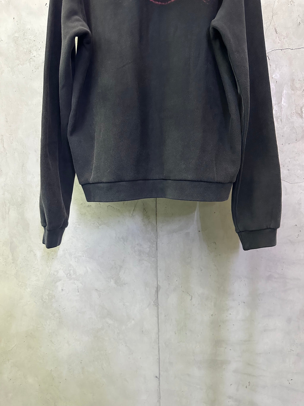 Balenciaga dark hoodie with ribbed hem and long sleeves