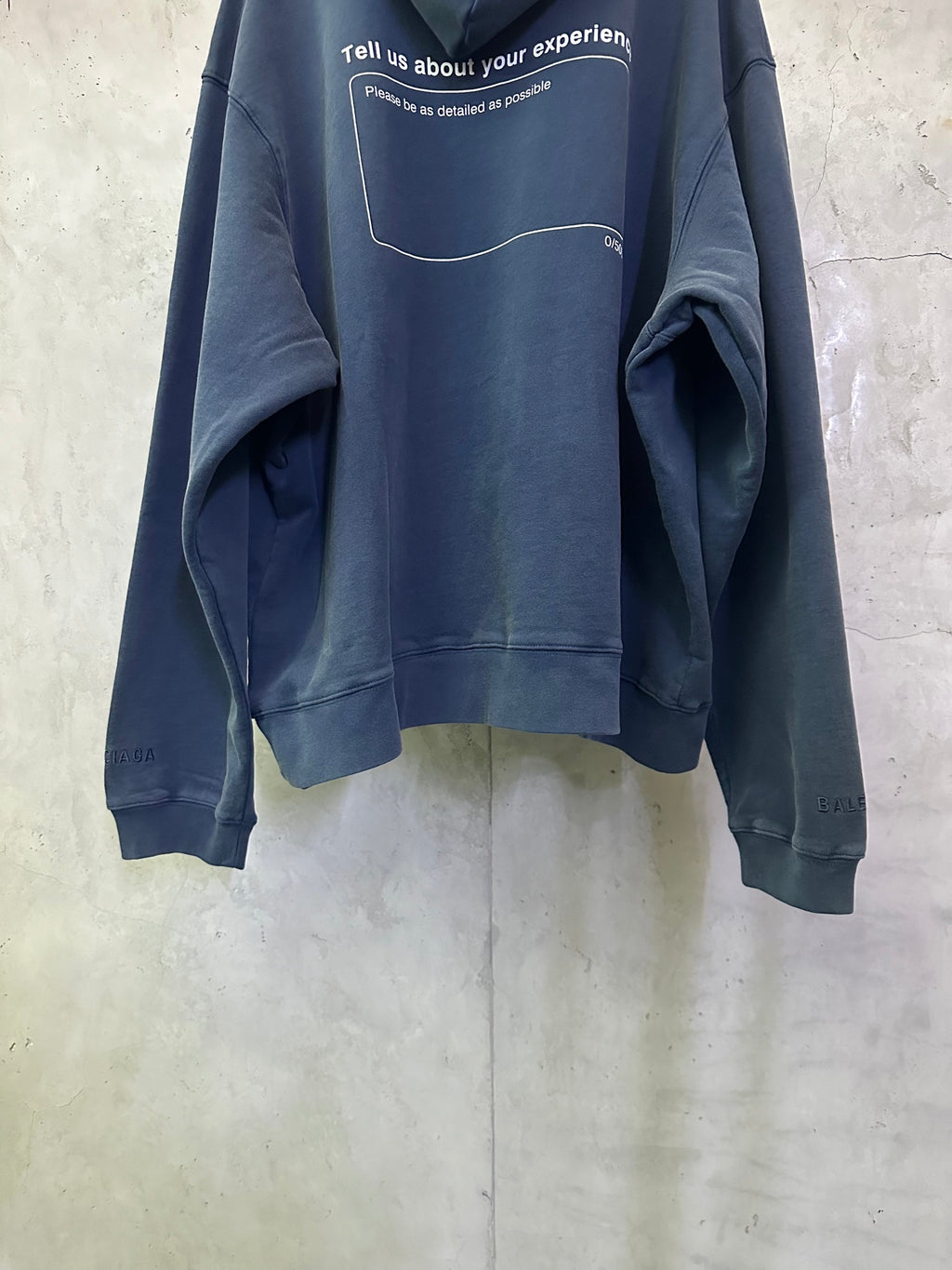 Balenciaga long hoodie blue with rear text panel and kangaroo pocket