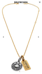 Gold chain necklace with round silver medallion and gold Cancer charm tag