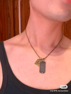Silver-tone charm necklace with rectangular dog tag pendant