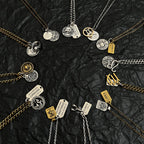 Balenciaga charm necklace assortment with mixed metal pendants and logo tags