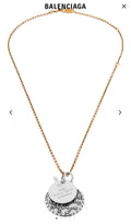 Balenciaga gold-tone necklace with circular charm pendant and round disk tag