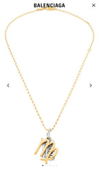 Gold-tone chain necklace with Virgo charm pendant and small rectangular date tag