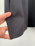 Fendi T-shirt sleeve hem with double-stitch seam detail, dark gray.