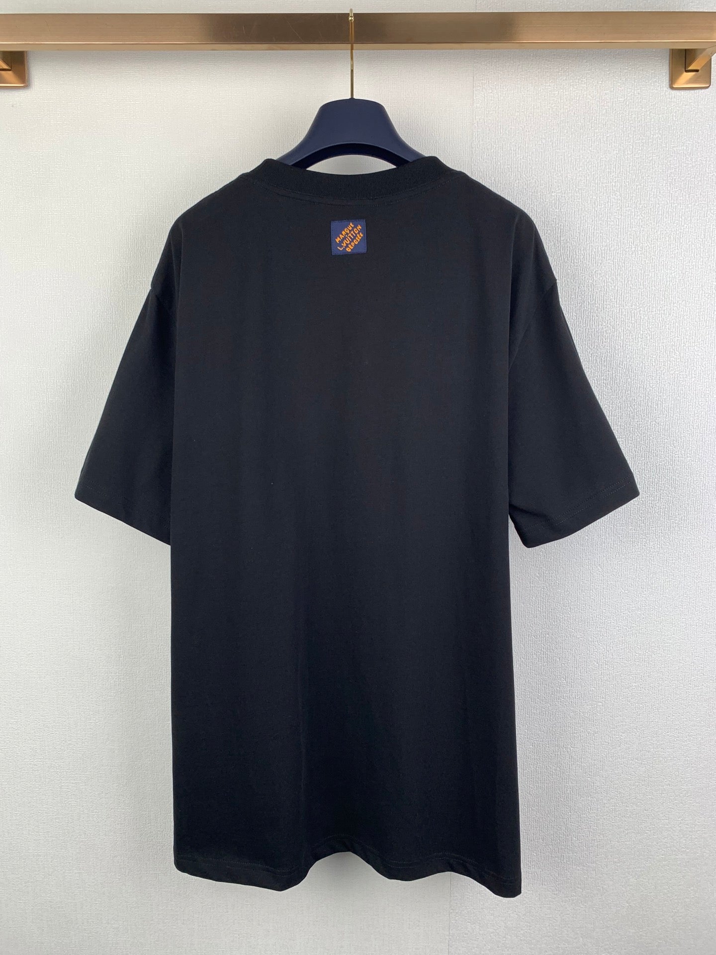 Louis Vuitton dark short-sleeve T-shirt with small square logo patch on back