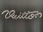 Louis Vuitton rhinestone script logo detail on dark T-shirt