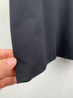 Louis Vuitton dark short-sleeve T-shirt hem with visible stitching