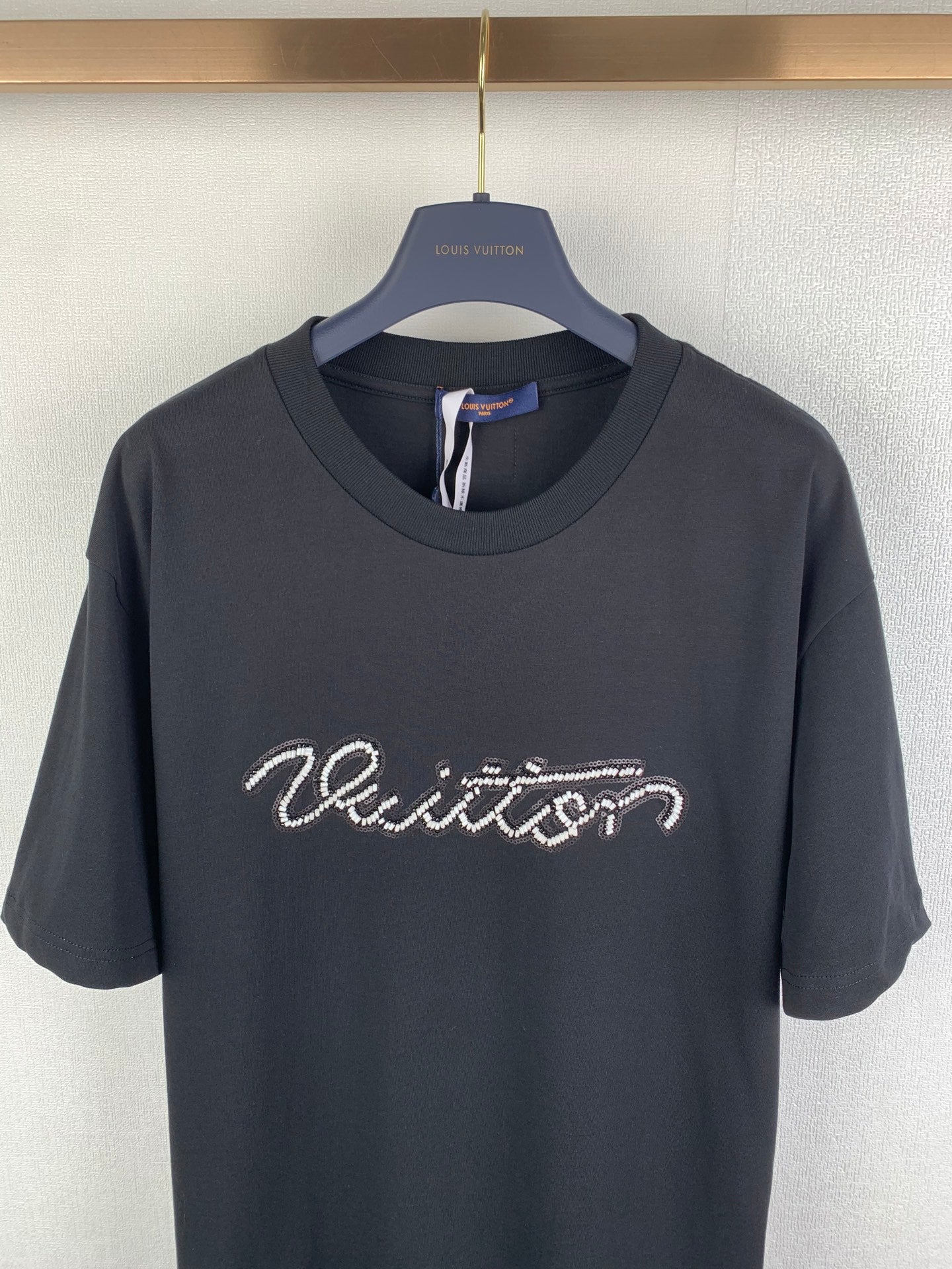 Louis Vuitton black short-sleeve T-shirt with rhinestone script logo on chest