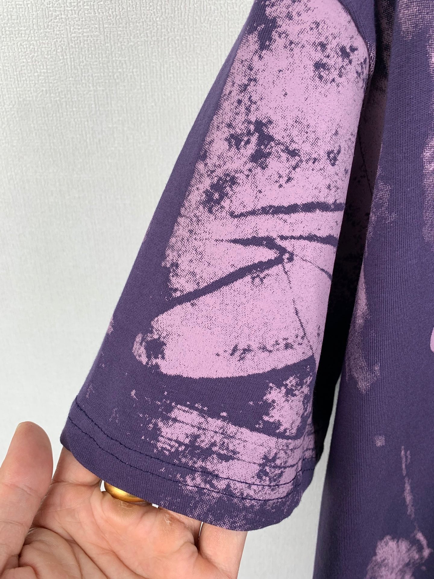 Louis Vuitton purple T-shirt with printed sleeve panel from side angle