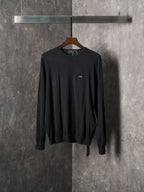 Black crewneck knit sweater with small chest logo detail