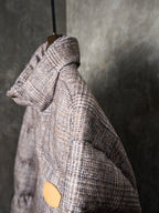 Louis Vuitton long puffer jacket hood and back view with buttoned waist tab
