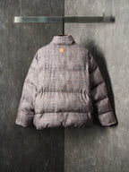 Louis Vuitton long puffer jacket back view with quilted panel and snap closure