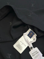 Louis Vuitton T-shirt interior label and neck tag on dark knit