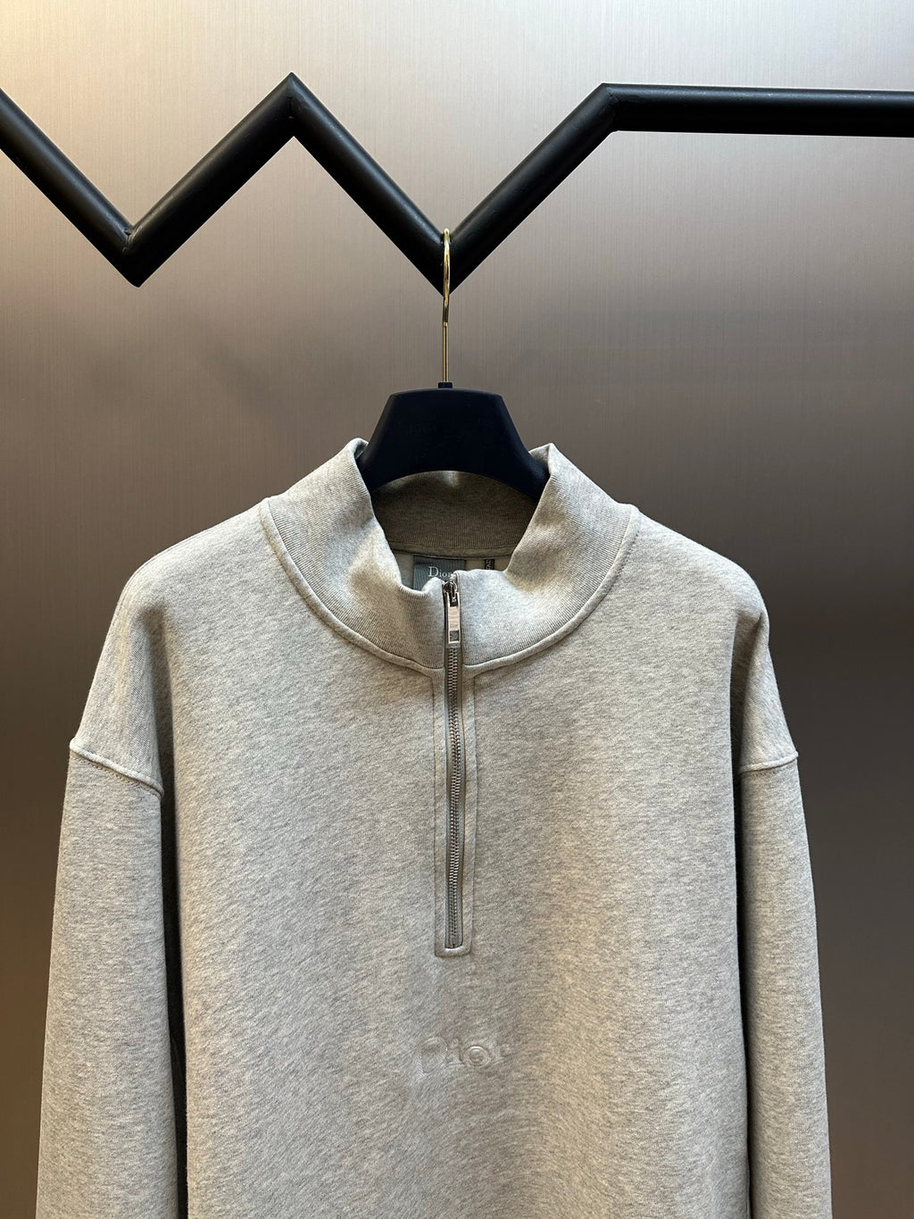 Light gray heather half-zip sweatshirt with stand collar and short zipper placket