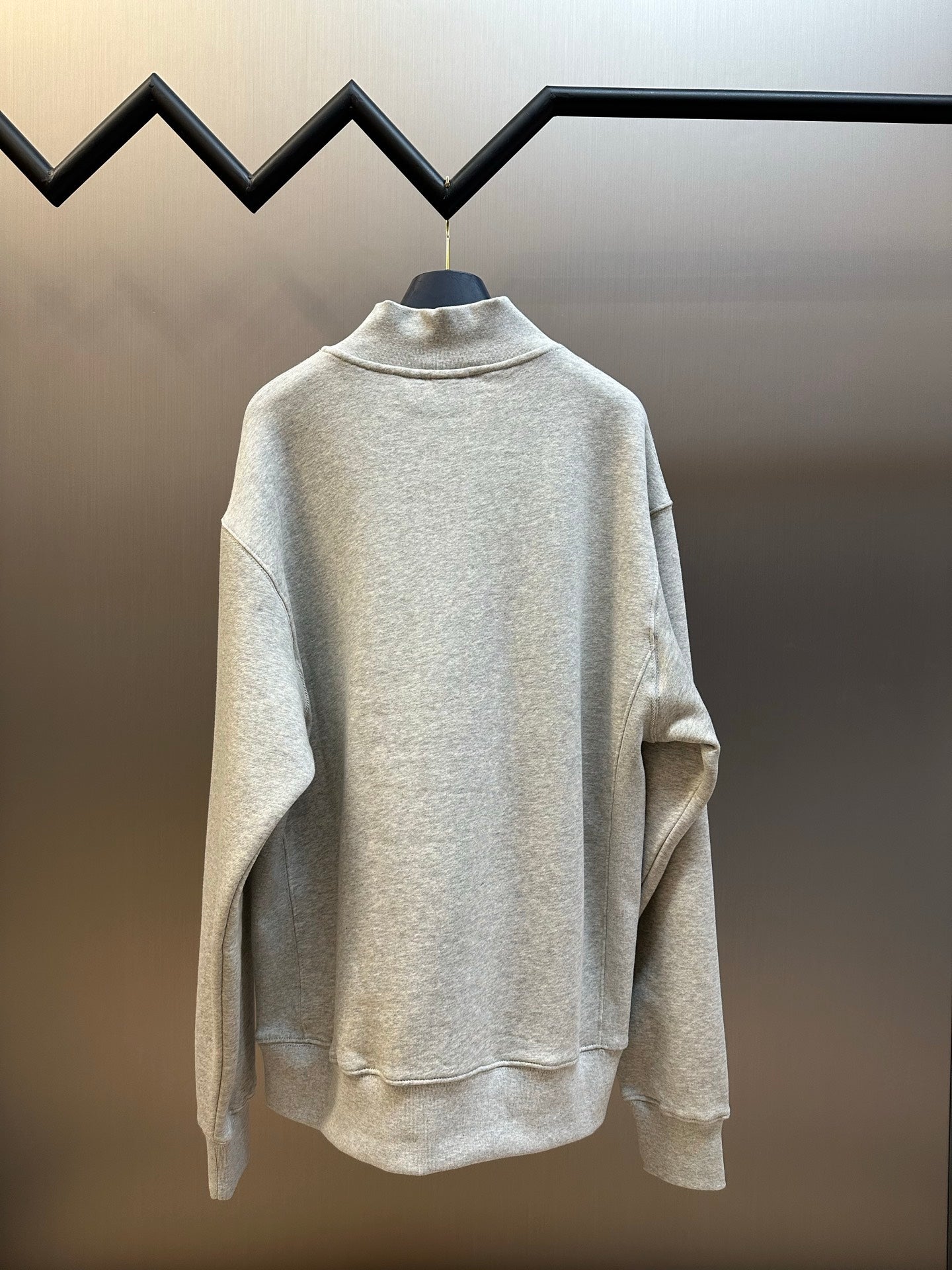 Dior heather gray long-sleeve hoodie, back view with high collar