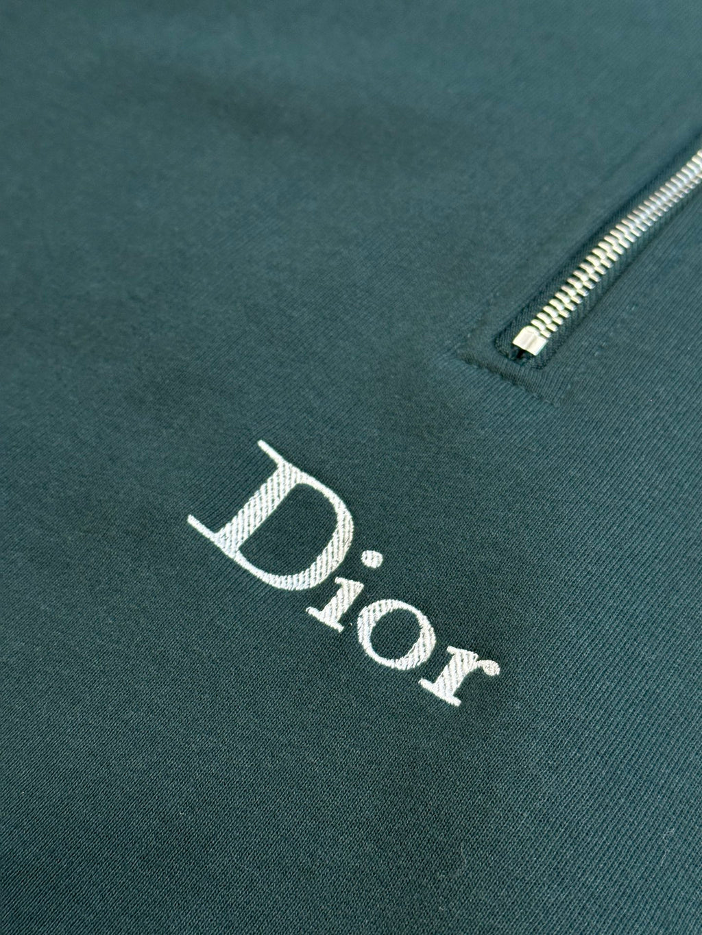 Teal Dior sweatshirt with embroidered logo and partial front zipper