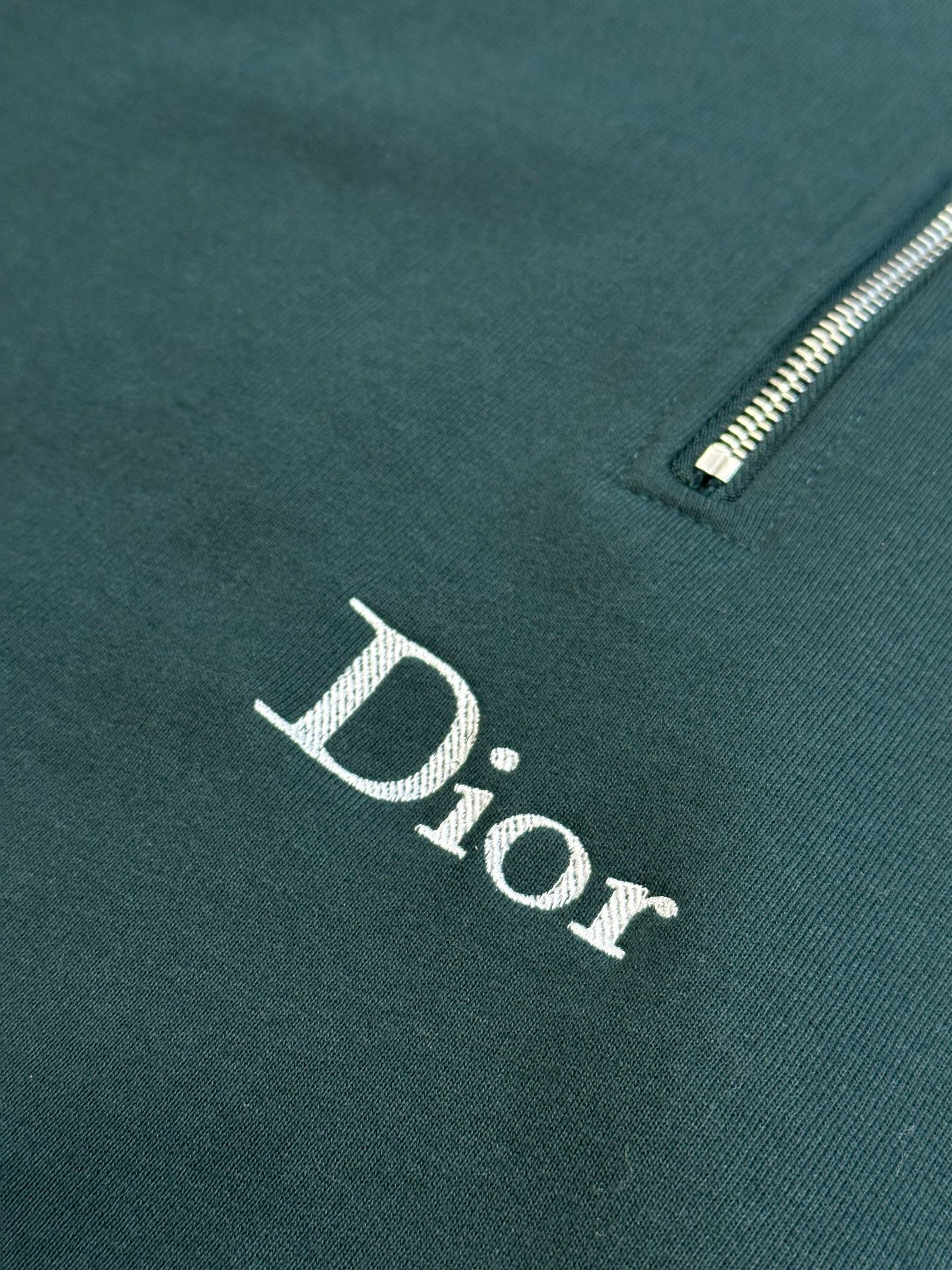 Teal Dior sweatshirt with embroidered logo and partial front zipper
