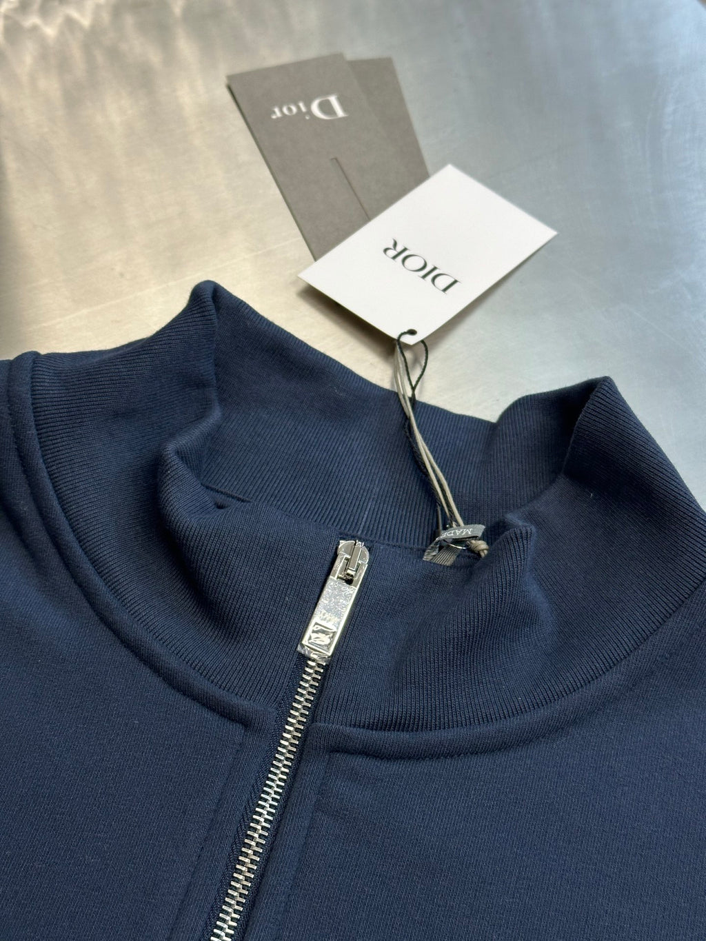 Dark blue Dior hoodie neckline detail with metal zipper and ribbed collar