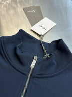 Dark blue Dior hoodie neckline detail with metal zipper and ribbed collar