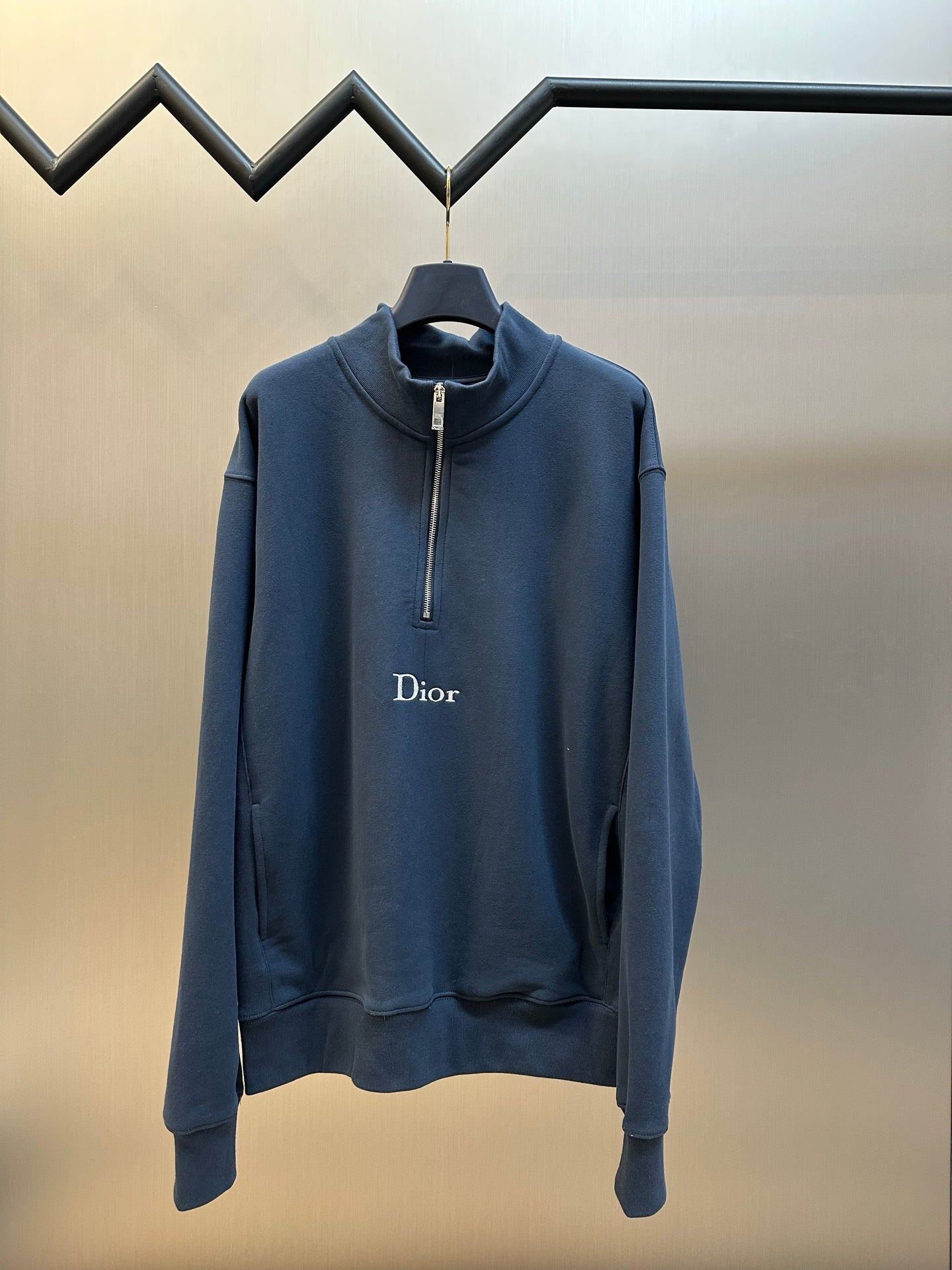Dark blue Dior quarter-zip hoodie with stand collar and small chest Dior logo