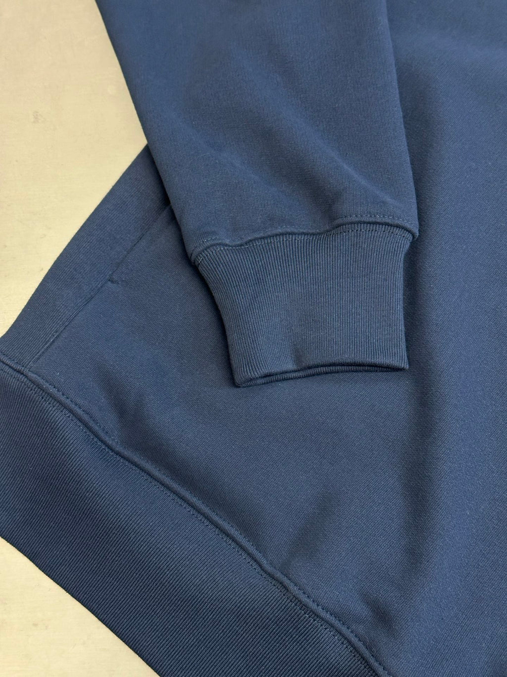 Dark blue Dior hoodie sleeve and hem with ribbed cuffs