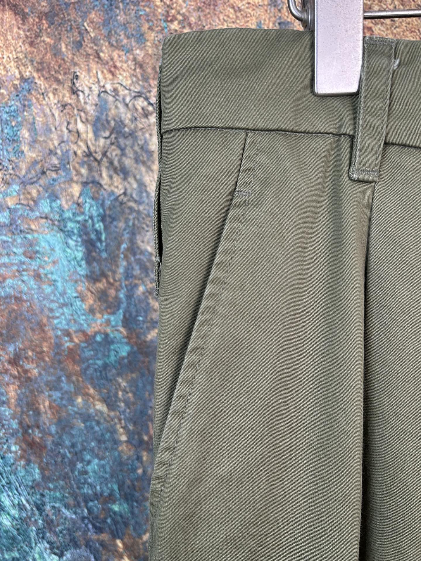 Olive pants waistband with belt loops and side pocket panel