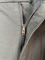 Olive pants with silver zipper and waistband button