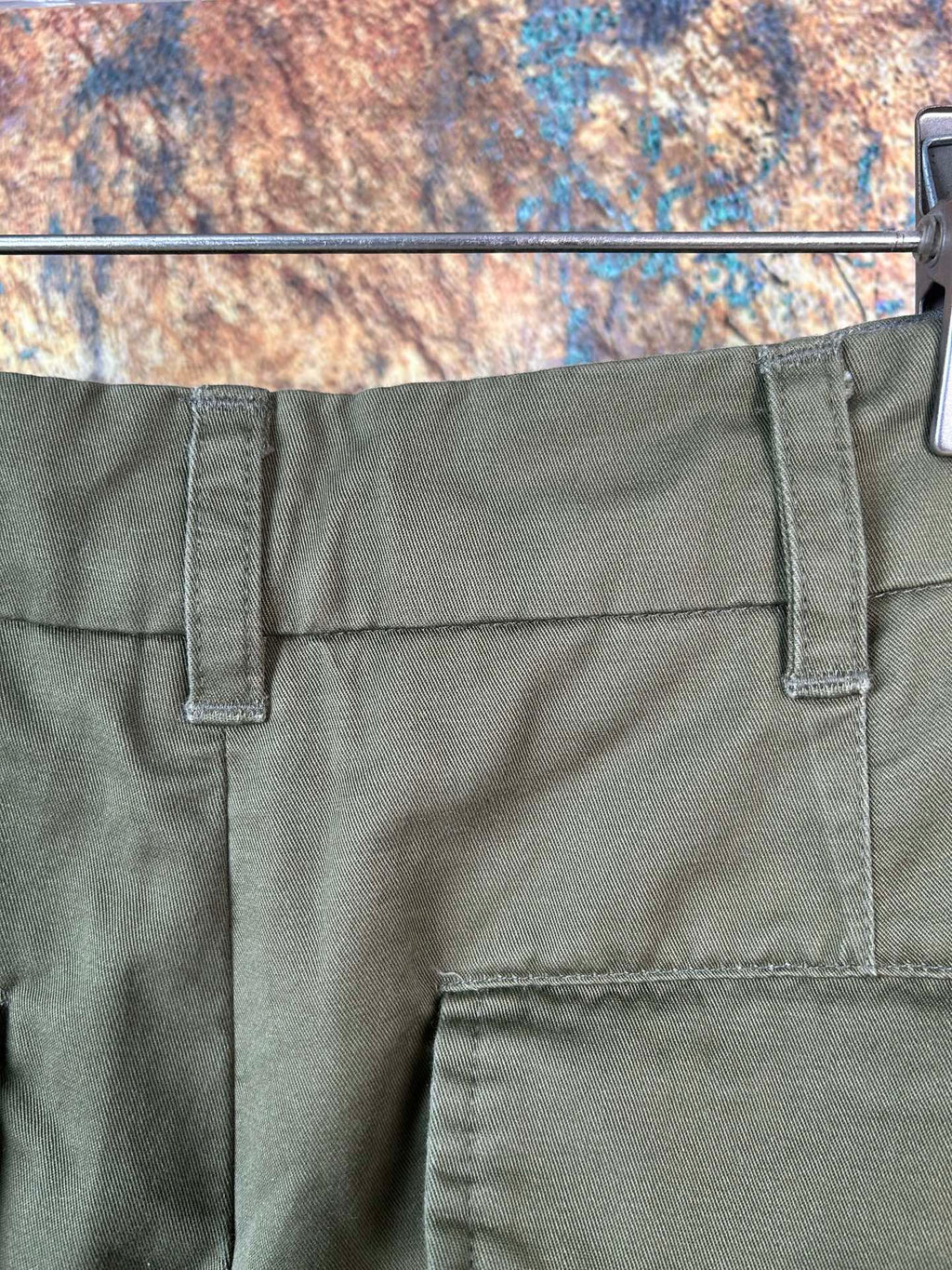Olive pants back yoke with belt loops and stitched pocket panels