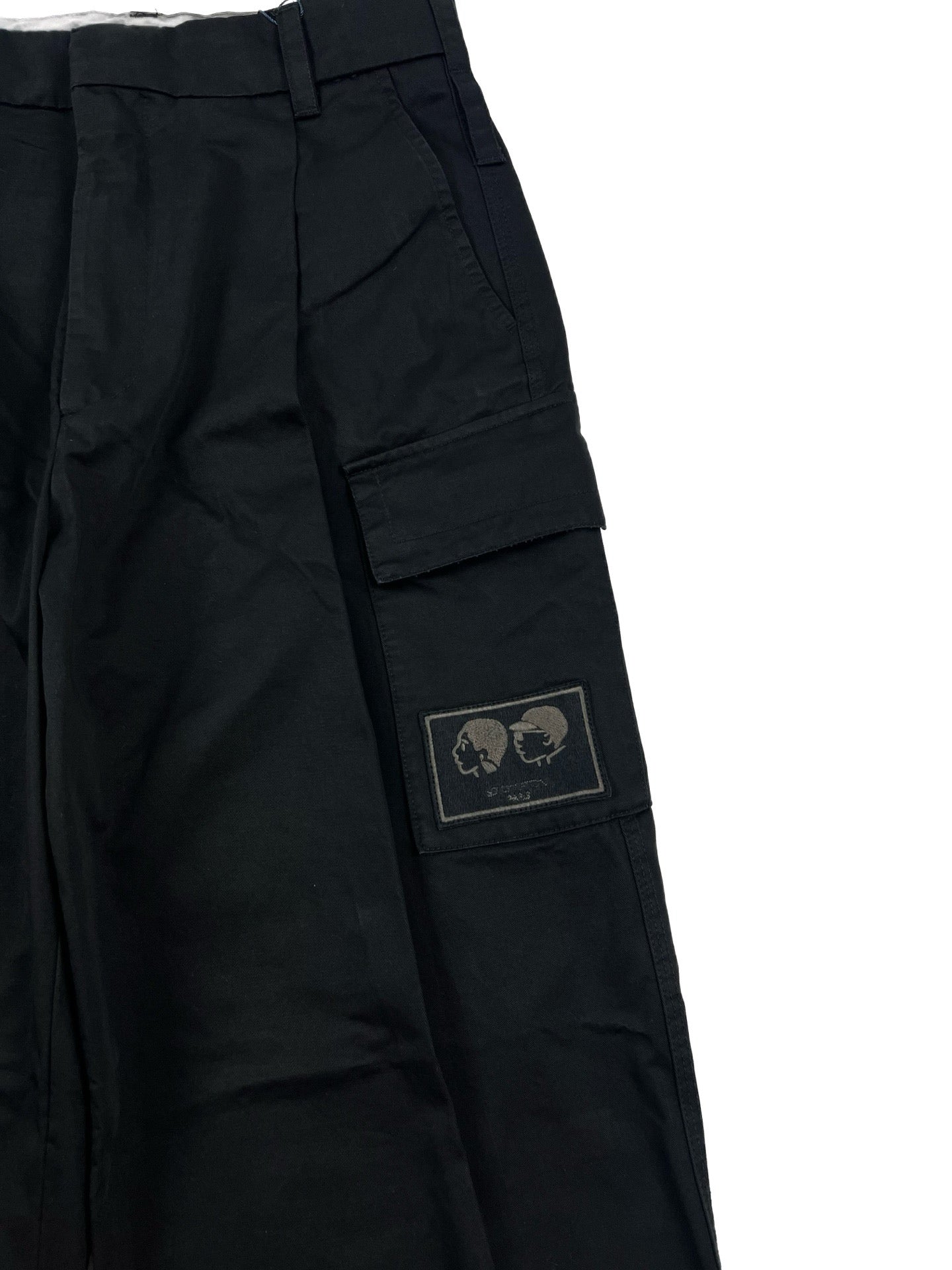 Dark cargo pants with side cargo pocket and square logo patch