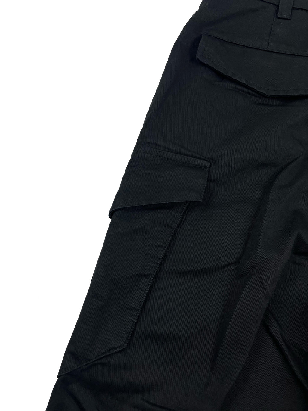 Dark cargo pants with front patch pockets and stitched paneling