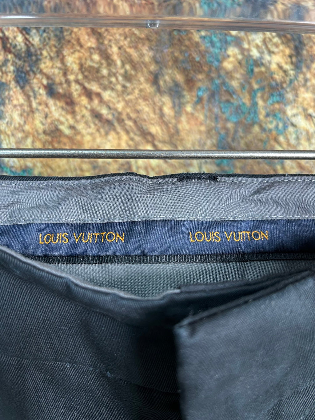 Black cargo pants with Louis Vuitton logo waistband label