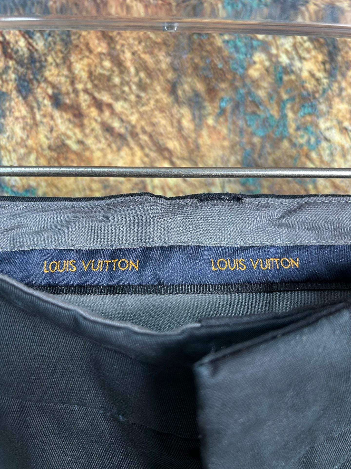 Black cargo pants with Louis Vuitton logo waistband label