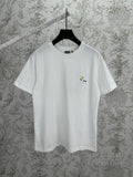 White crewneck T-shirt with small daisy logo embroidery on left chest.