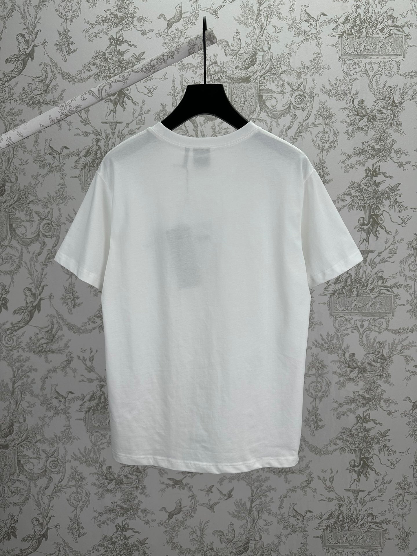 White crewneck short-sleeve T-shirt, back view.