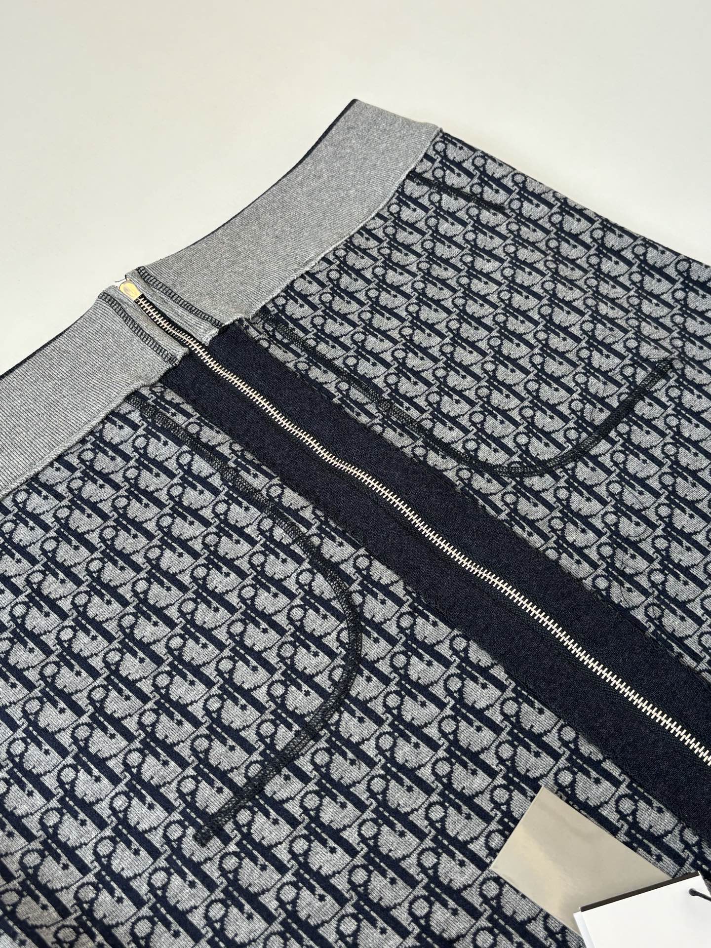 Dior patterned front hoodie panel with zipper and gray trim