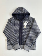 Dior hoodie with dark pattern hood lining and gray ribbed cuffs