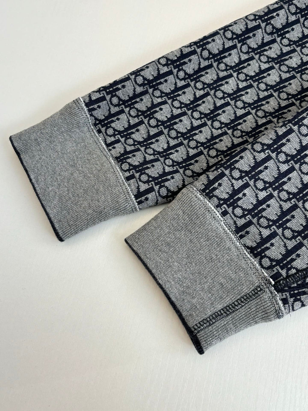 Dior long socks pair, gray cuffs with navy Dior-patterned knit fabric