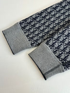 Dior long socks pair, gray cuffs with navy Dior-patterned knit fabric