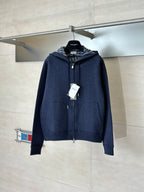 Dior navy zip-up hoodie with hood and ribbed cuffs, front view