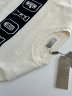 Dior sweater sleeve and ribbed collar with dark logo band and tag