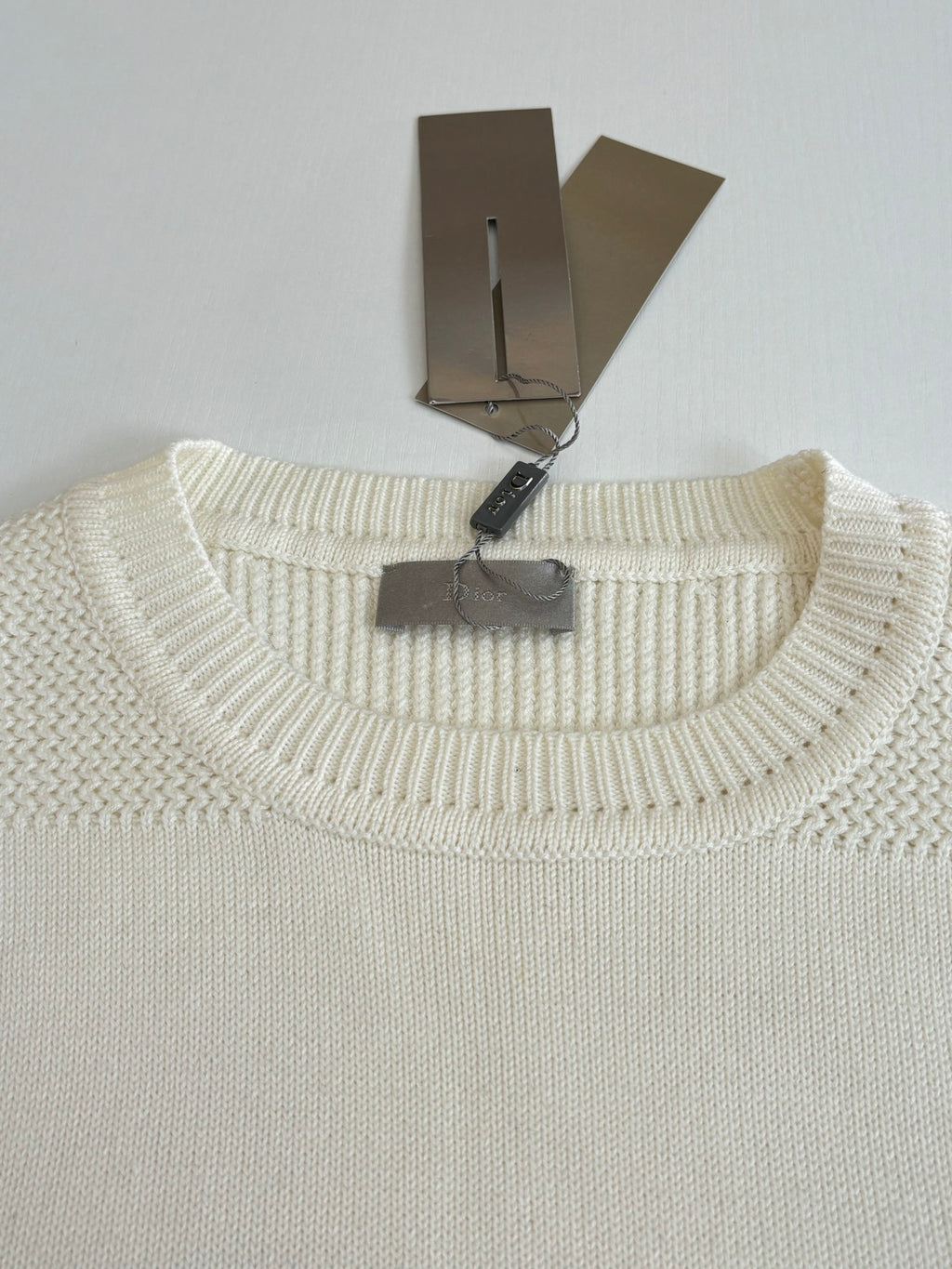Dior crewneck sweater neckline in cream knit with ribbed collar