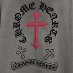 Gray short-sleeve T-shirt close-up of red cross with black ring text print