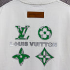 White T-shirt back with green flower and star logo patch set